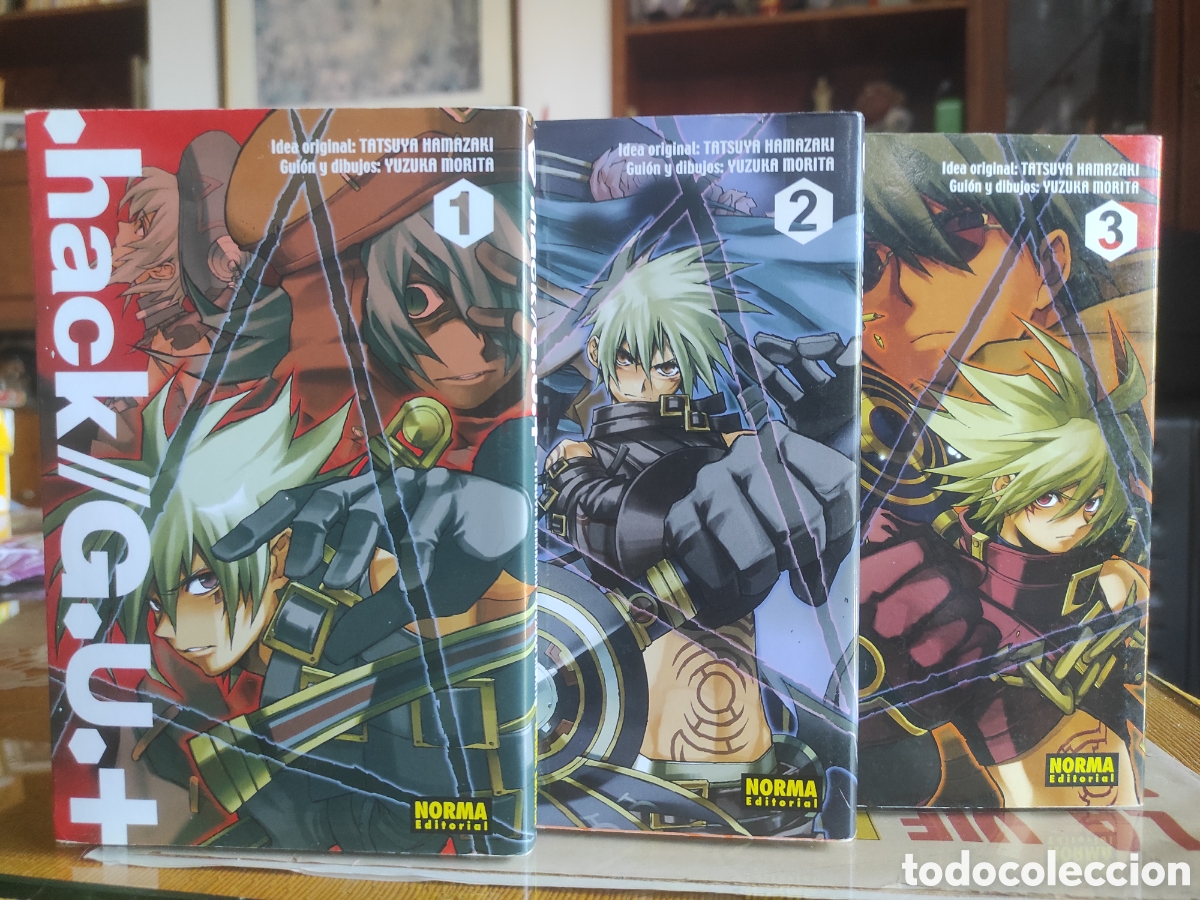 C&oacute;mics: Comic Hack//G.U.+1, 2 y 3: escrita por Tatsuya Hamazaki y dibujada Yuzuka Morita. Norma Editorial