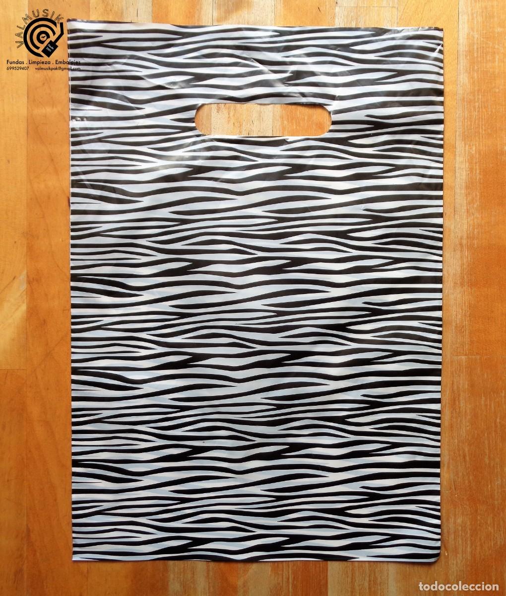C&oacute;mics: 100 BOLSA PL&Aacute;STICO CEBRA 25x35cm PARA COMERCIO EN GENERAL - Foto 1