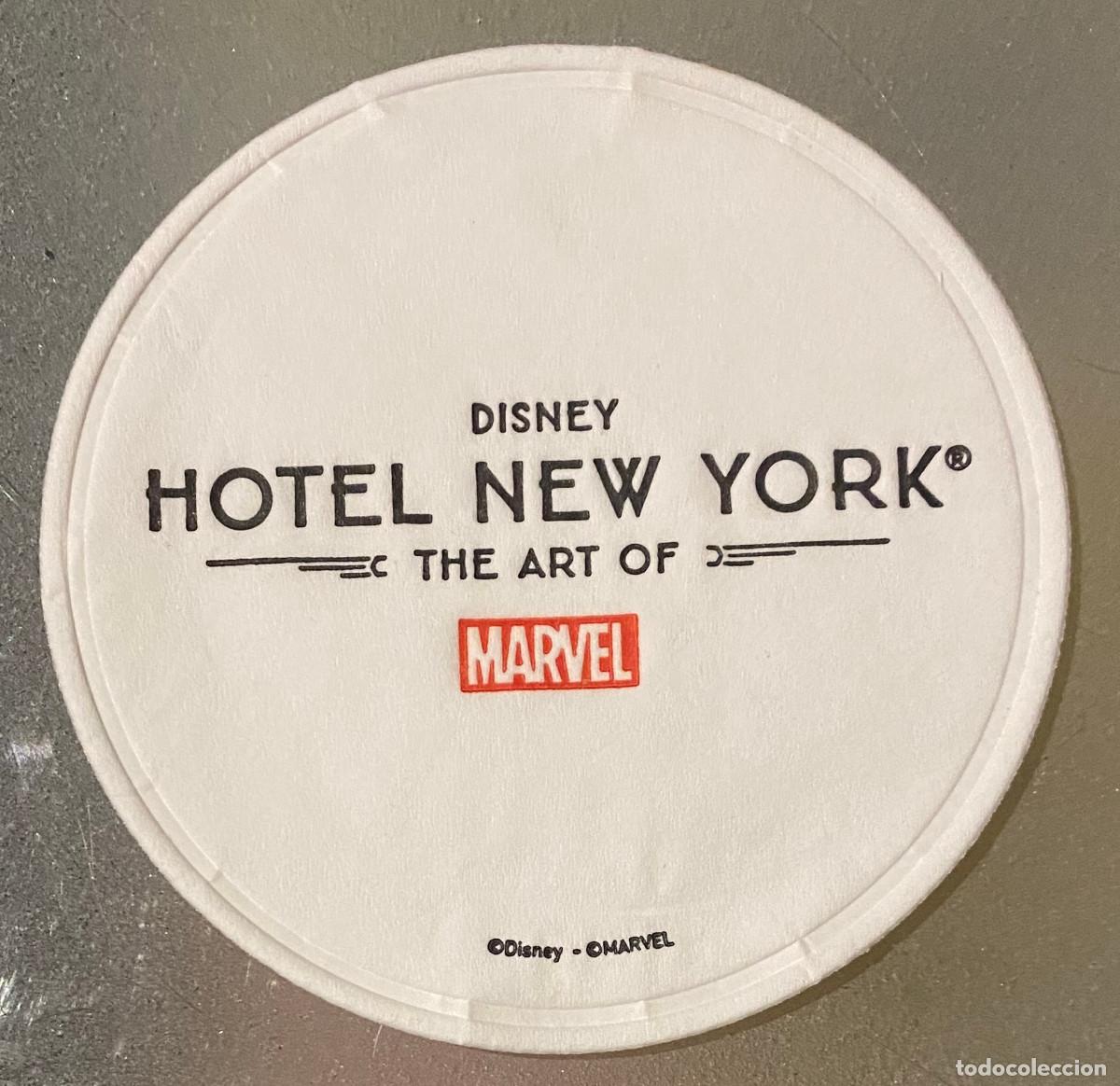 C&oacute;mics: Posavasos publicitario de Hotel New York en Disneyland Paris. Hotel tematizado de c&oacute;mics Marvel.