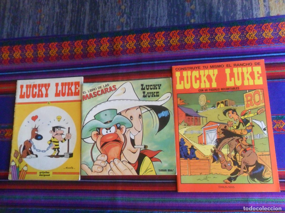 Comics: LUCKY LUKE EL LIBRO DE LAS M&Aacute;SCARAS Y RECORTABLE EL RANCHO TIMUN MAS. REGALO 6 GRIJALBO 1985. RAROS.