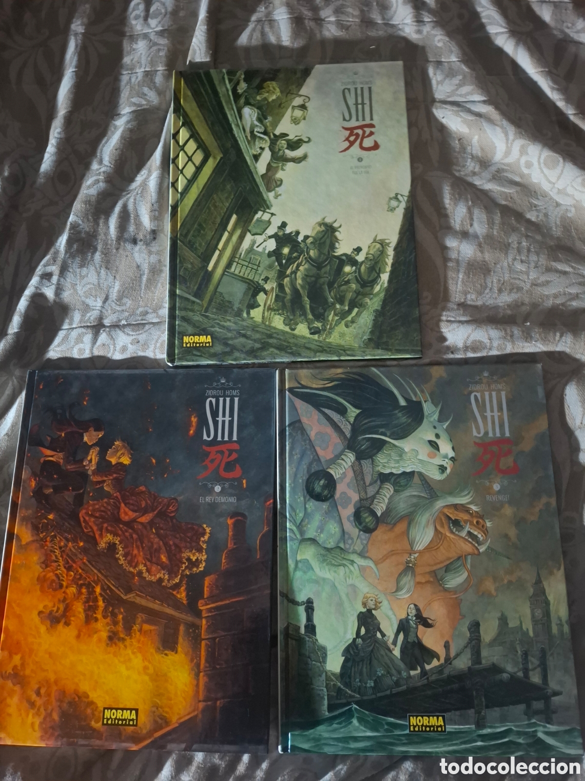 C&oacute;mics: Shi. Zidrou y Homs. Tomos 1, 2 y 3.. Norma editorial. Tapa dura