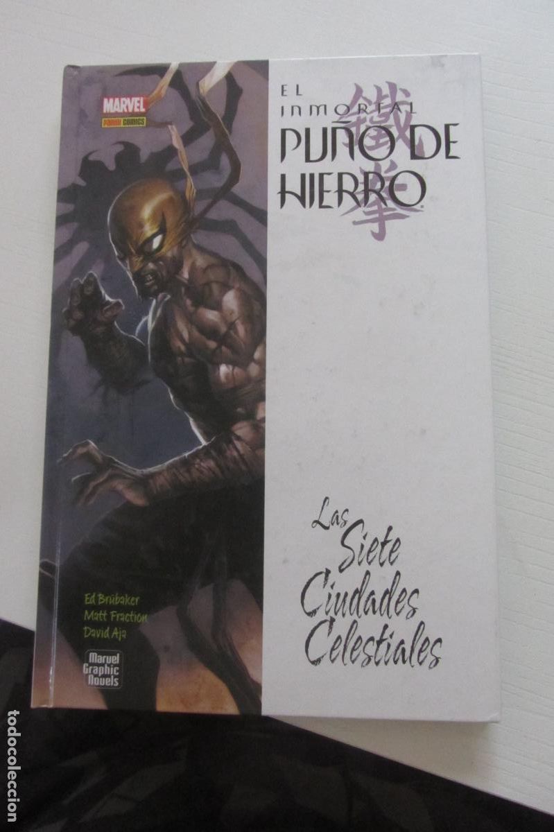 C&oacute;mics: EL INMORTAL PU&Ntilde;O DE HIERRO 2 LAS SIETE CIUDADES CELESTIAL MARVEL PANINI BRUBAKER FRACTION AJA ARX230