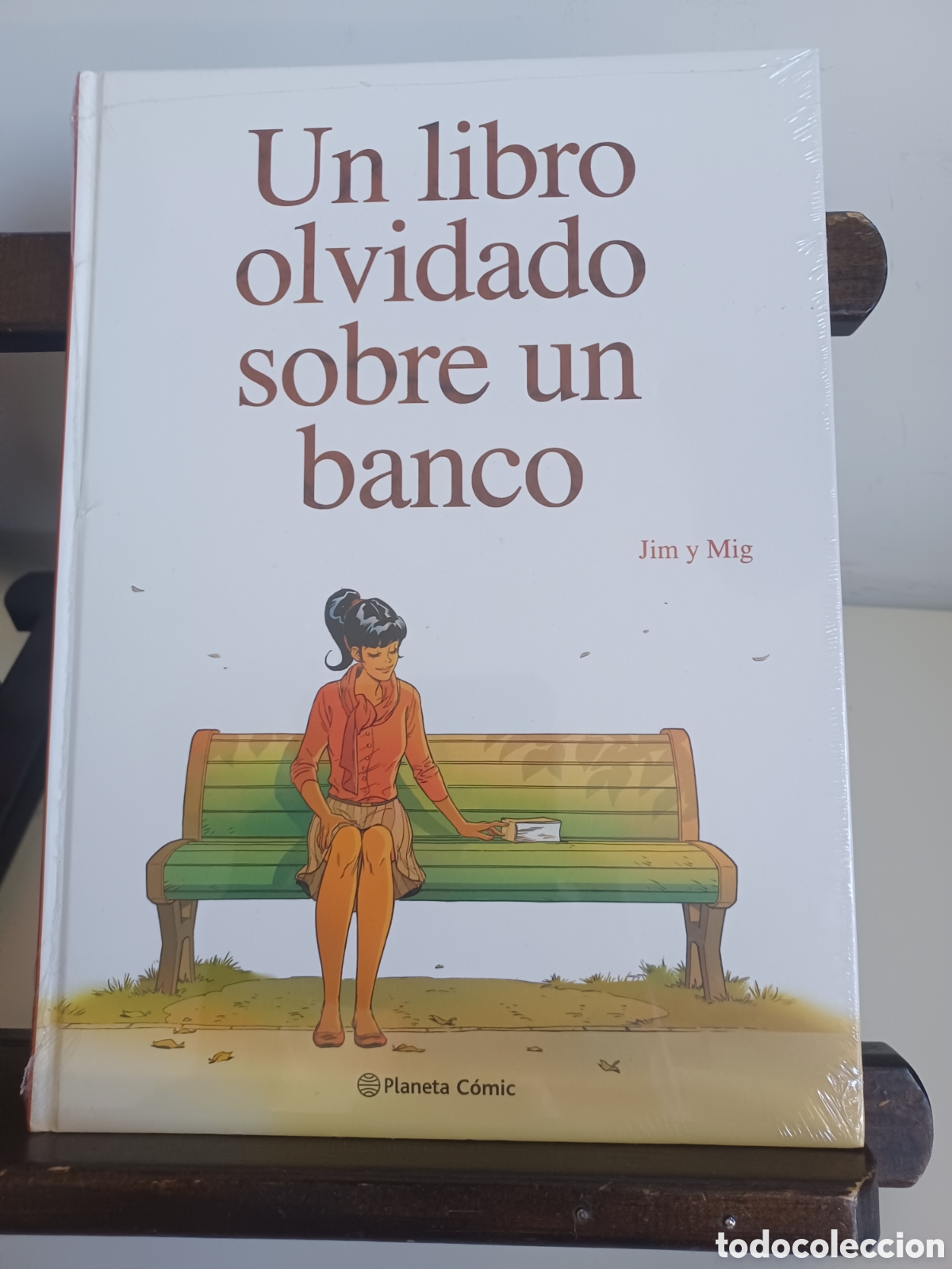 C&oacute;mics: Un libro olvidado sobre un banco/ Jim & Mig/ Planeta C&oacute;mic/ NUEVO PRECINTADO