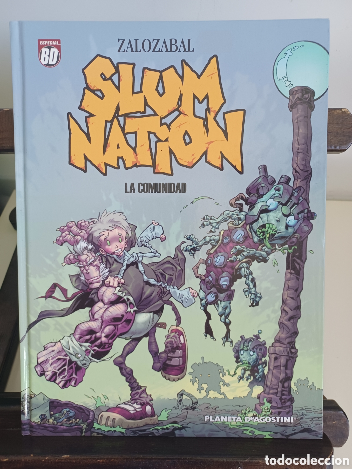 C&oacute;mics: Slum Nation. La Comunidad/ BD Planeta DeAgostini/ NUEVO A ESTRENAR