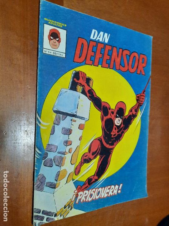 C&oacute;mics: DAN DEFENSOR 1. PRISIONERA. GRAPA. BUEN ESTADO PERO LE FALTA UN TROCITO EN 1&ordf; P&Aacute;G. caj. 87