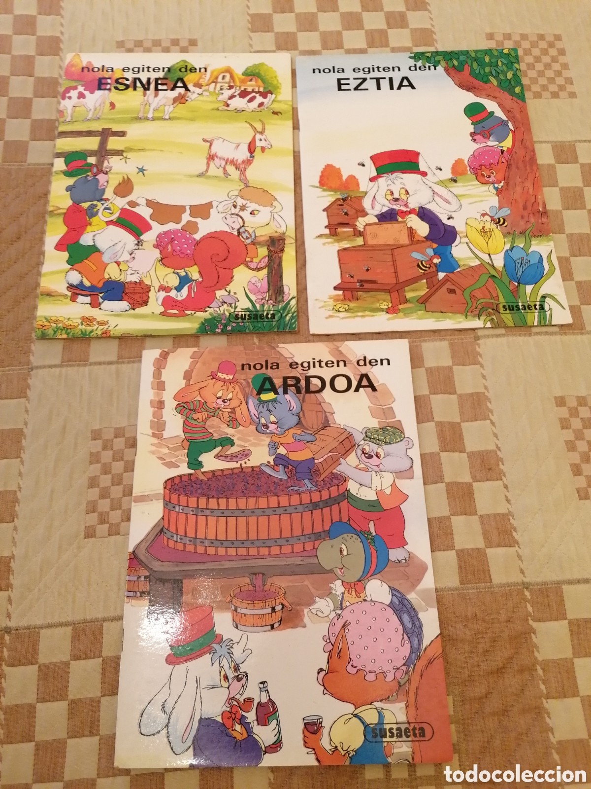 C&oacute;mics: Nola Egiten Den Eztia, Ardoa, Esnea. C&oacute;mo Se Hace,La Miel, El Vino, La Leche.Euskera.Susaeta.Cuentos