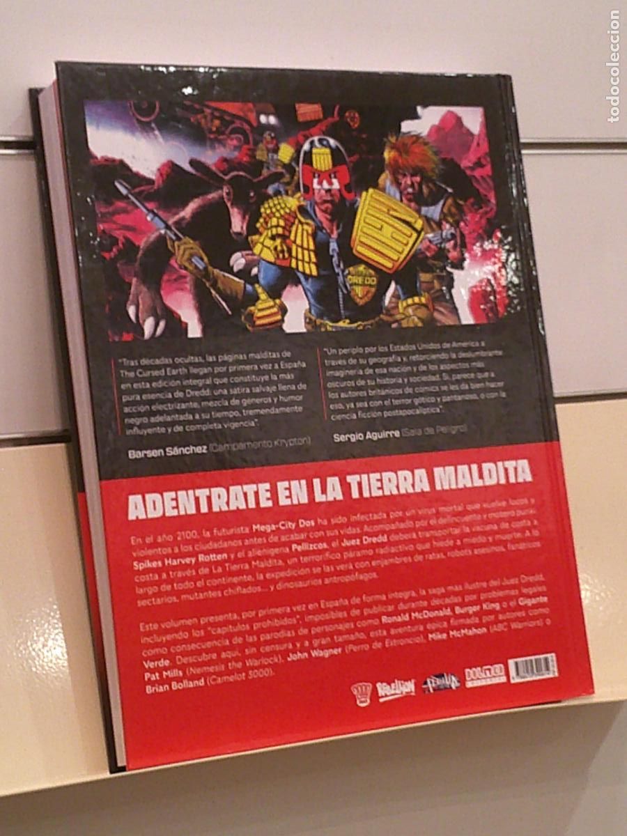 C&oacute;mics: JUEZ DREDD LA TIERRA MALDITA - DOLMEN OFERTA - Foto 2