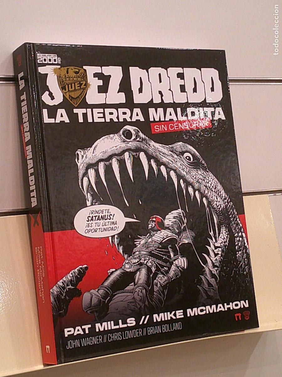 C&oacute;mics: JUEZ DREDD LA TIERRA MALDITA - DOLMEN OFERTA - Foto 1