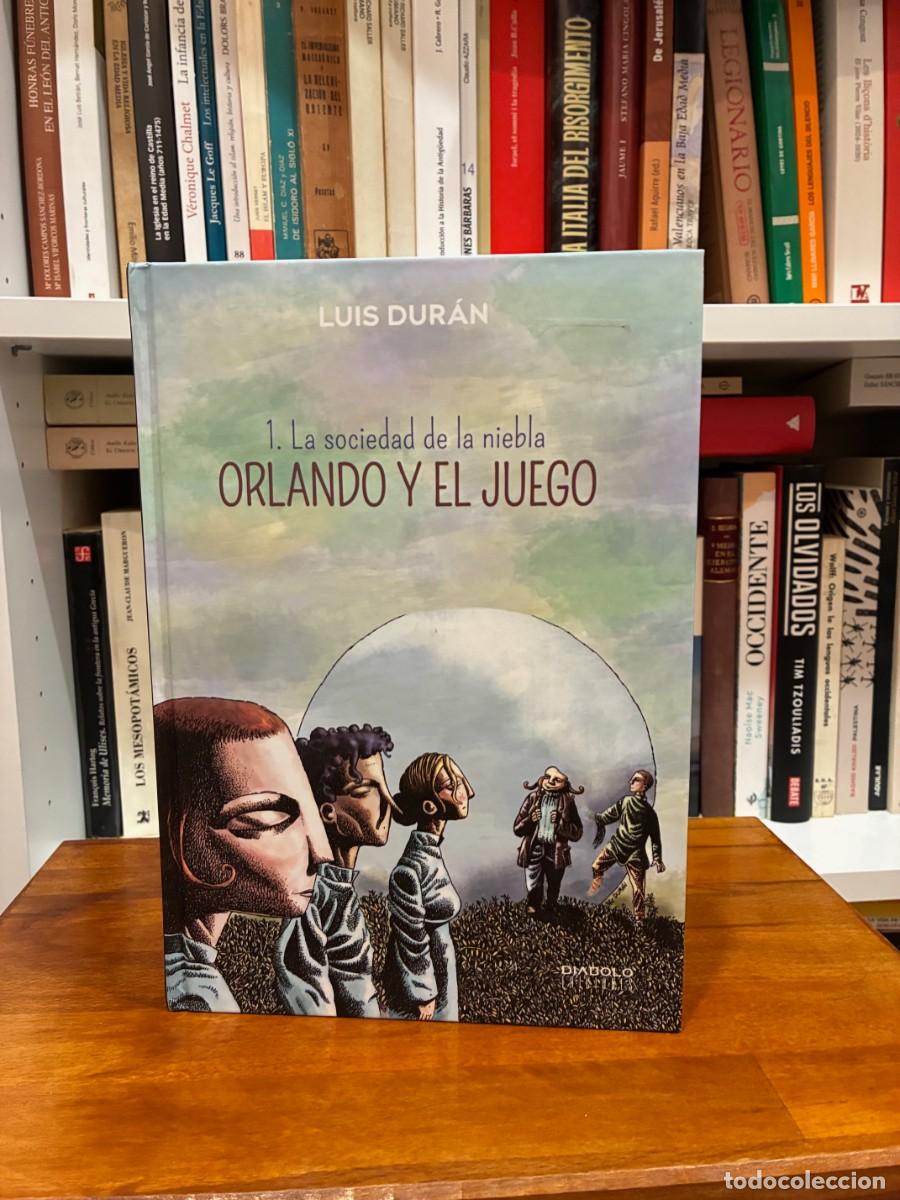C&oacute;mics: Orlando y el juego. 1. La sociedad de la niebla. Lu&iacute;s Dur&aacute;n. Di&aacute;bolo ediciones.