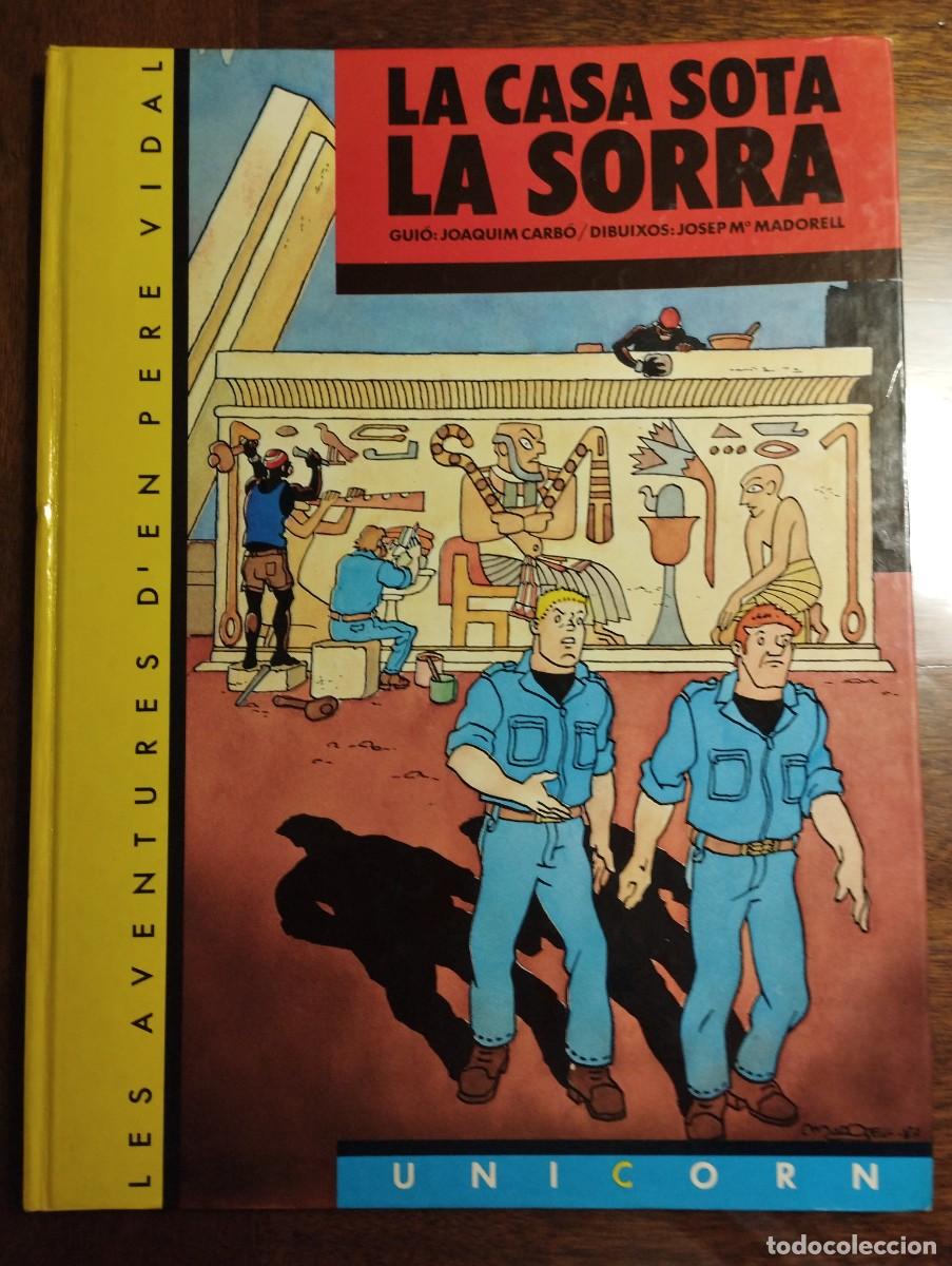 C&oacute;mics: La CASA SOTA LA SORRa / LES AVENTURES D'EN PERE VIDAL 1 - JOAQUIM CARBO, JOSEP M. MADORELL / 1983