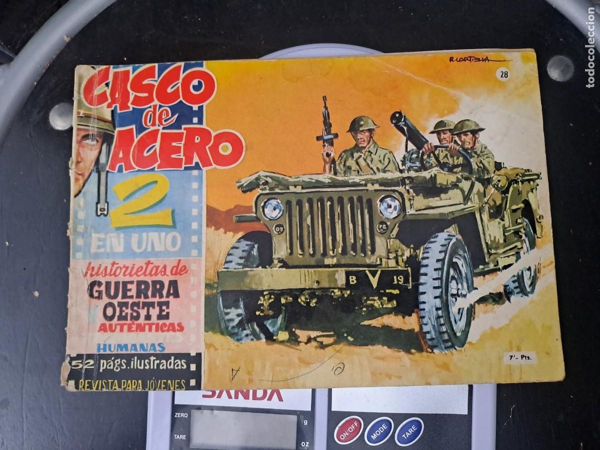 C&oacute;mics: Casco de acero 2 en uno 28, Manhattan en buen estado Bolsa DA