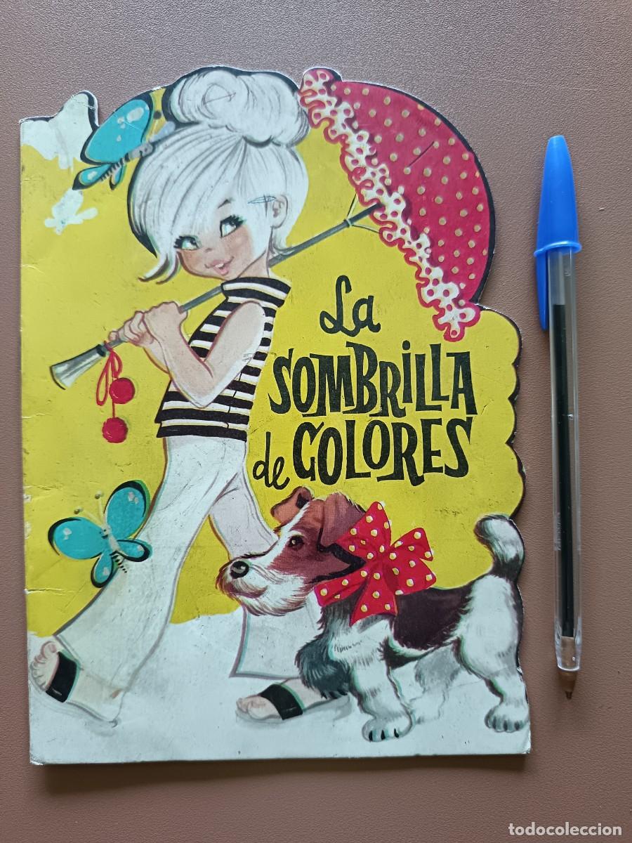 C&oacute;mics: CUENTO TROQUELADO- LA SOMBRILLA DE COLORES