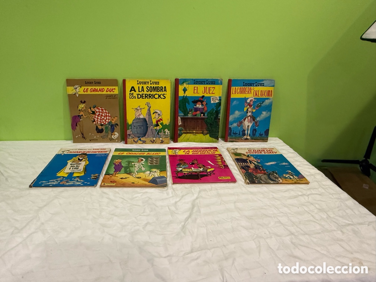 C&oacute;mics: Lote de 8 c&oacute;mics Lucky Luke vintage &ndash; Morris y Goscinny &ndash; Tapa dura y blanda