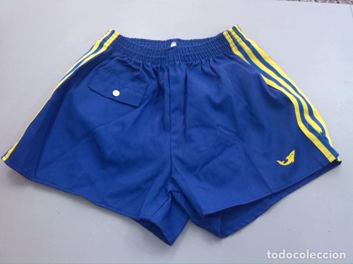 pantalon corto azul