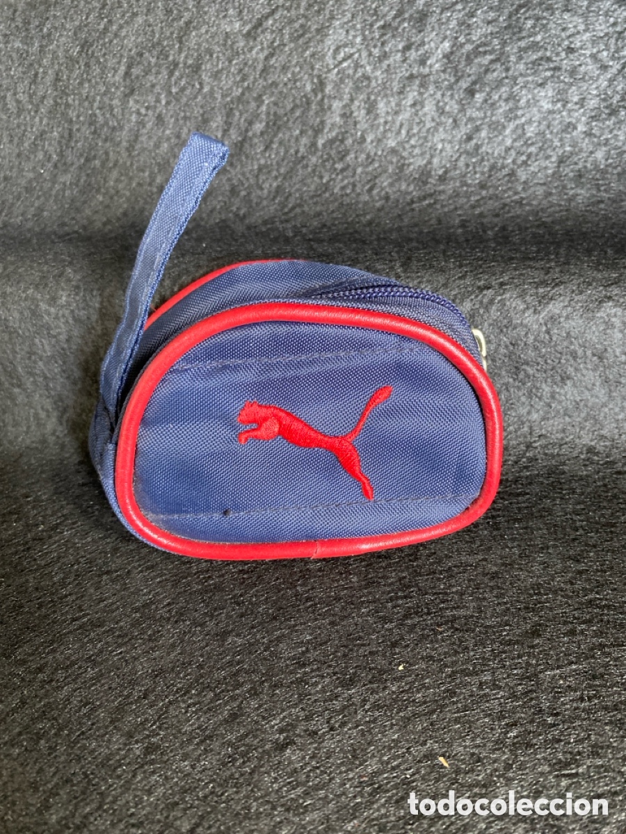 Coleccionismo deportivo: Portamonedas de puma oficial - Foto 1