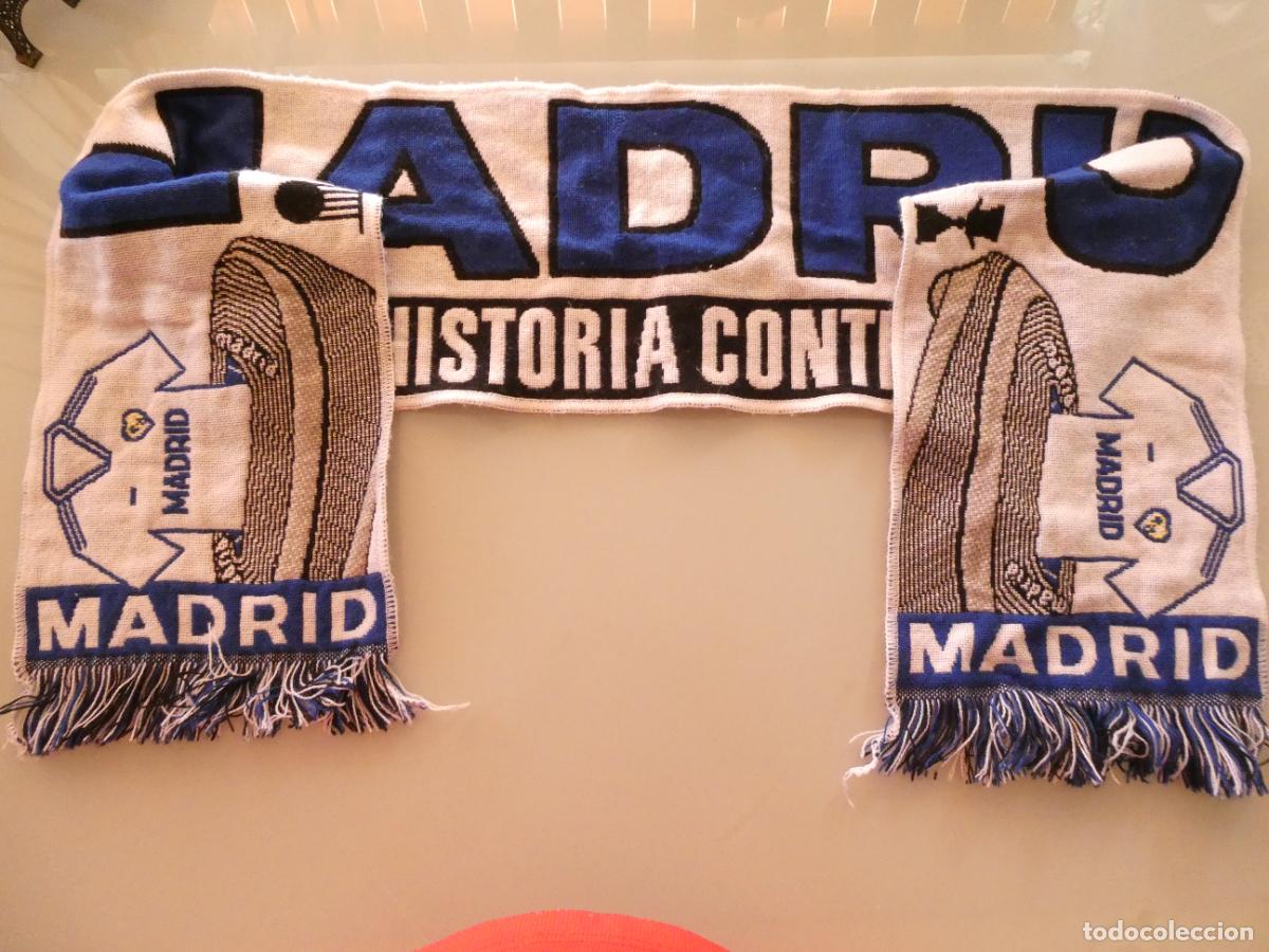 Coleccionismo deportivo: BUFANDA REAL MADRID CLUB DE F&Uacute;TBOL. LA HISTORIA CONTINUA. NUEVO SANTIAGO BERNABEU. 100GR
