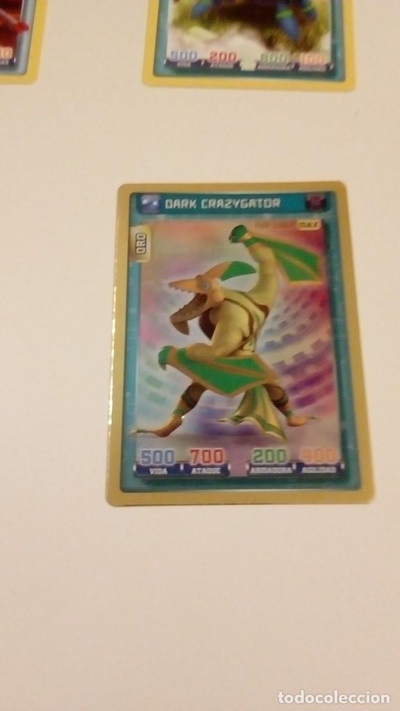 Coleccionismo cromos antiguos: caj-98 PANINI INVIZIMALS DARK CRAZYGATOR ORO - Foto 1
