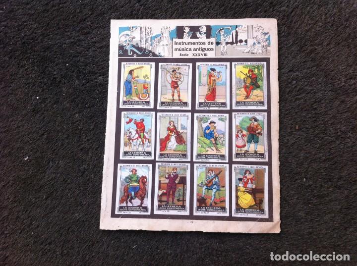 Collectable Antique Stickers: HOJA CON CROMOS DEL &Aacute;LBUM DE NESTL&Eacute; (A&Ntilde;OS 30) INSTRUMENTOS DE M&Uacute;SICA ANTIGUOS. 12 CROMOS