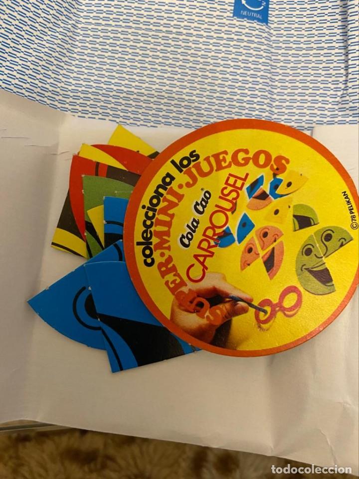 Coleccionismo Cromos antiguos: cola-cao super-mini-juegos carrousel redondel con cuatro caras falta un trocito de la roja
