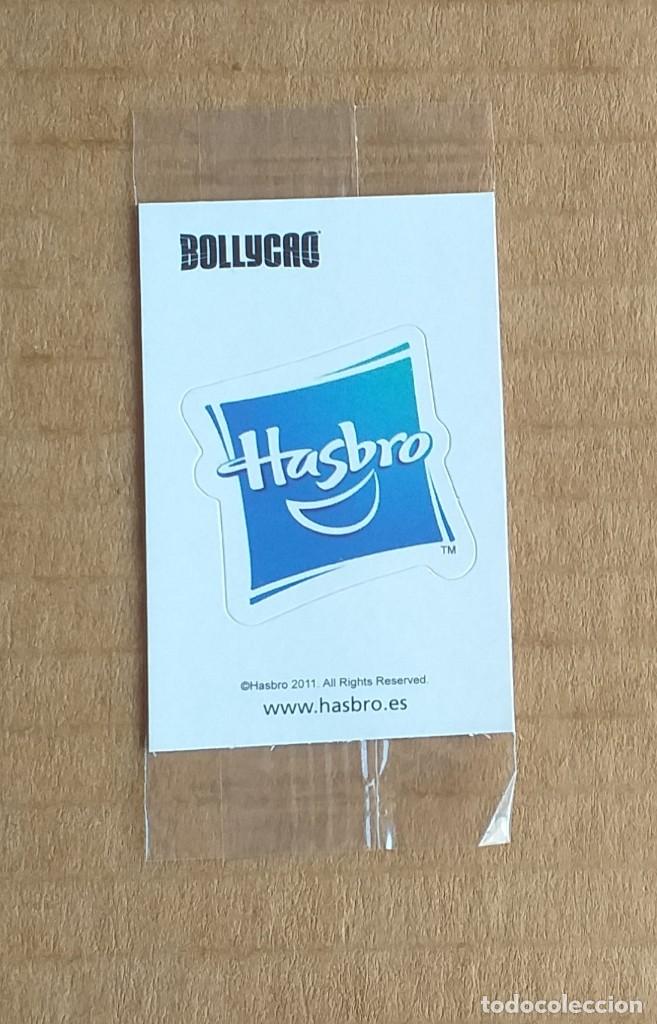 Coleccionismo cromos antiguos: Cromo Hasbro Marca MAN&Iacute;A de Bollycao. Precintado.