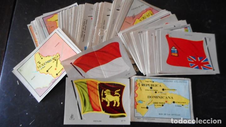 Collezionismo Figurine antiche: LOTE DE UNOS 400 CROMOS MAPAS ,BANDERAS Y ESCUDOS (USADOS)