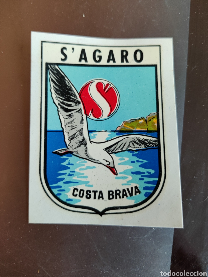 Collectionnisme Cartes &agrave; collectionner anciennes: ESTAMOS LIQUIDANDO. Pegatina Cromo Calcoman&iacute;a A&ntilde;os 70 Nueva Resto Tienda Escudo Ciudad de S' Agaro