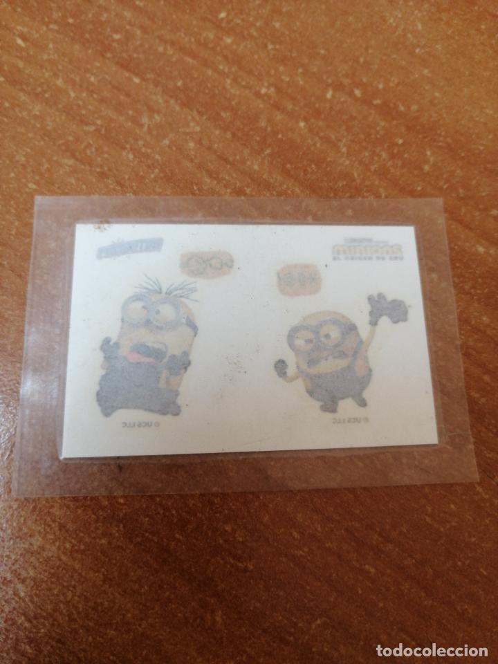 Coleccionismo Cromos antiguos: CROMO PEGATINA PHOSKITOS (MINIONS EL ORIGEN DE GRU )NUEVO EN SU ENVOLTORIO DE 2021
