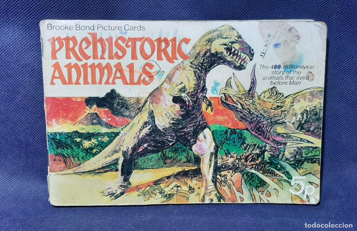 Collezionismo Figurine antiche: Antiguo &aacute;lbum Prehistoric animals