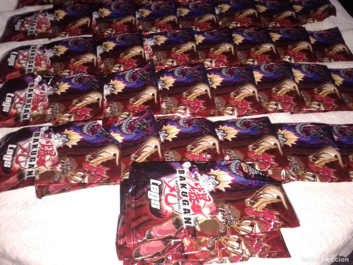 Coleccionismo cromos antiguos: BAKUGAN TAGS, 54 SOBRES SIN ABRIR, M - Foto 2