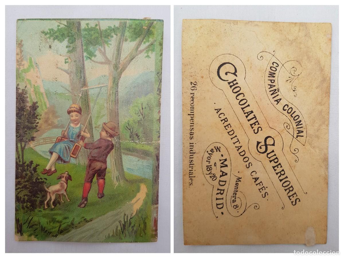 Collezionismo Figurine antiche: Antiguo cromo: Dos ni&ntilde;os columpi&aacute;ndose, publicidad Chocolates Superiores. Madrid.