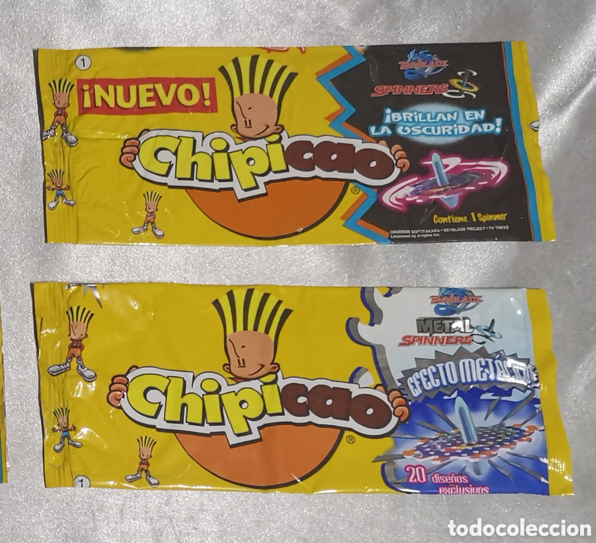 Coleccionismo cromos antiguos: 2 ENVOLTORIOS BEYBLADE SPINNERS CHIPICAO - Foto 1