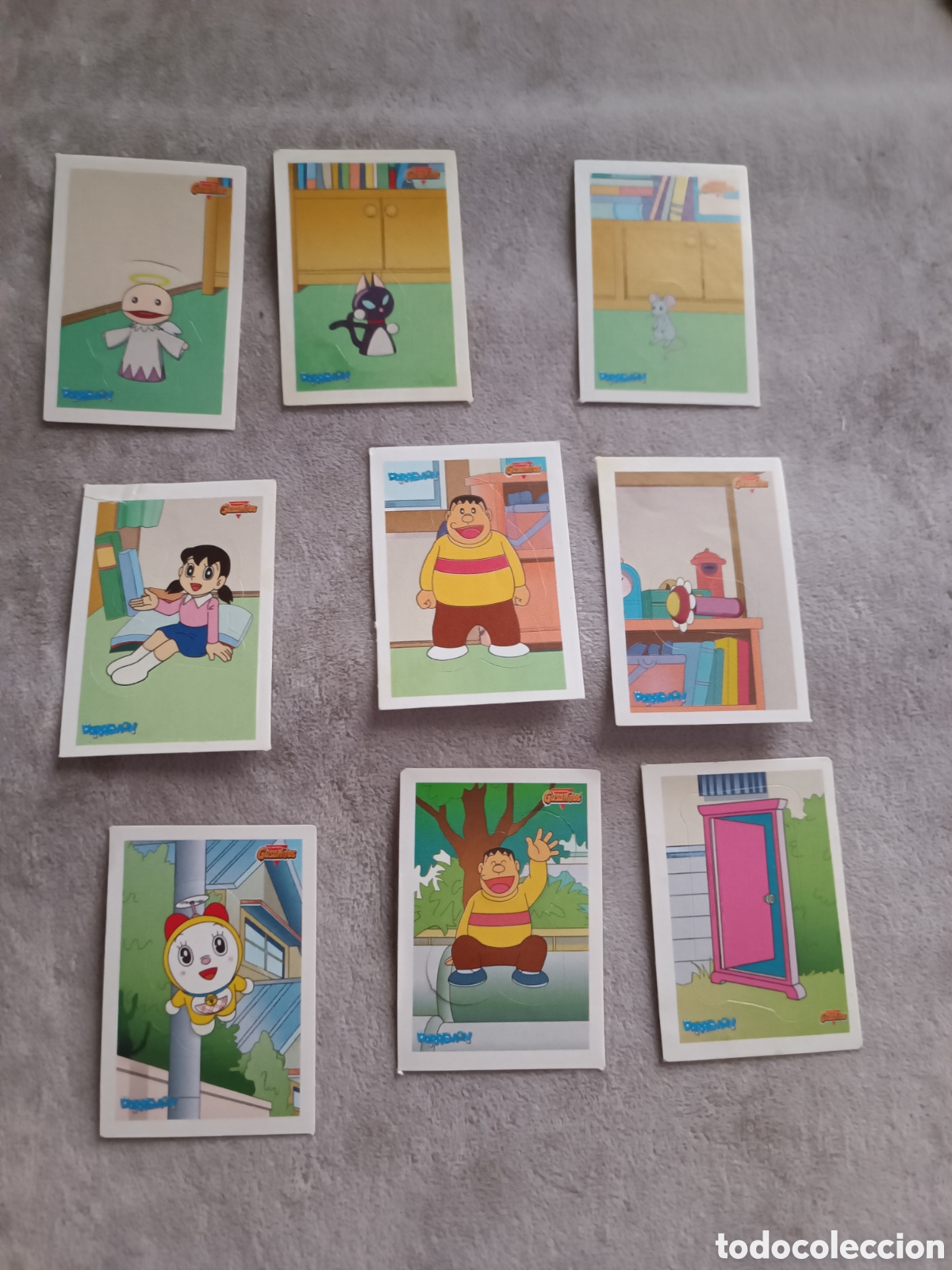 Coleccionismo cromos antiguos: ALBUM VACIO EN PLANCHA DE GUSANITOS RISI ( DORAEMON ) y 9 cromos RISI - Foto 2