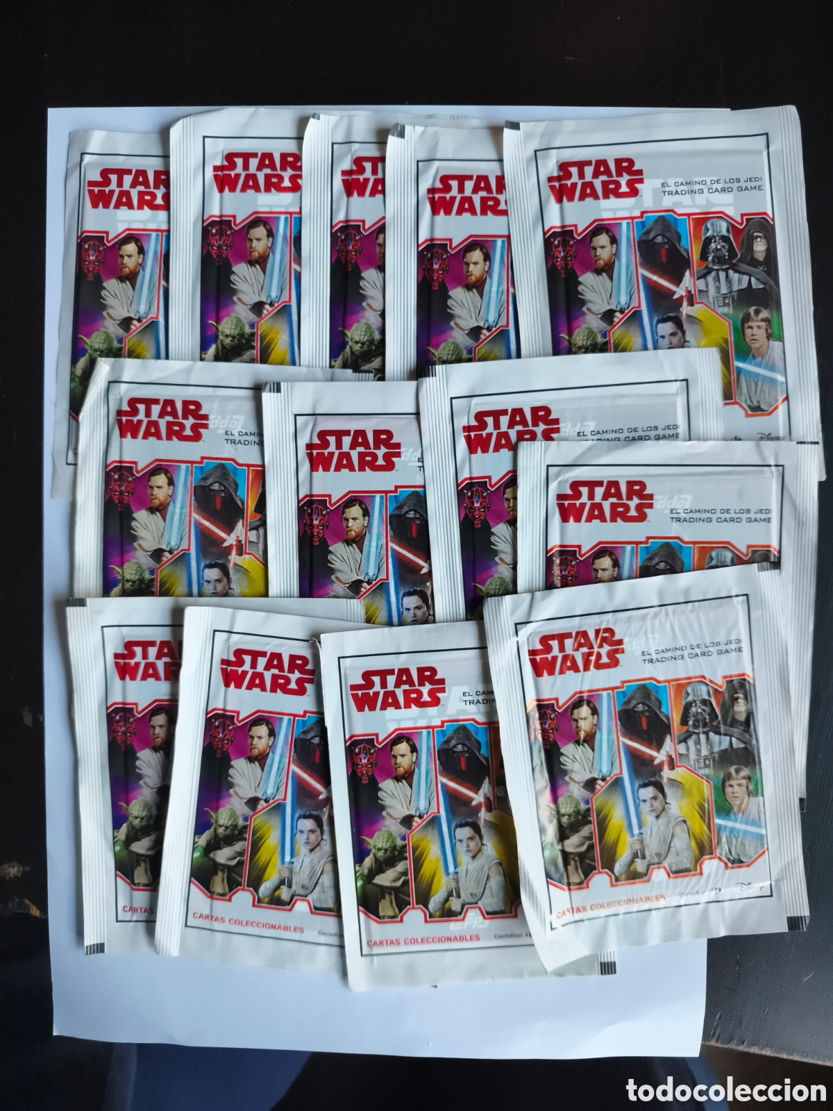 Coleccionismo Cromos antiguos: 12 SOBRES SIN ABRIR. 3 CARTAS POR SOBRE. STAR WARS.TOPPS CARREFOUR