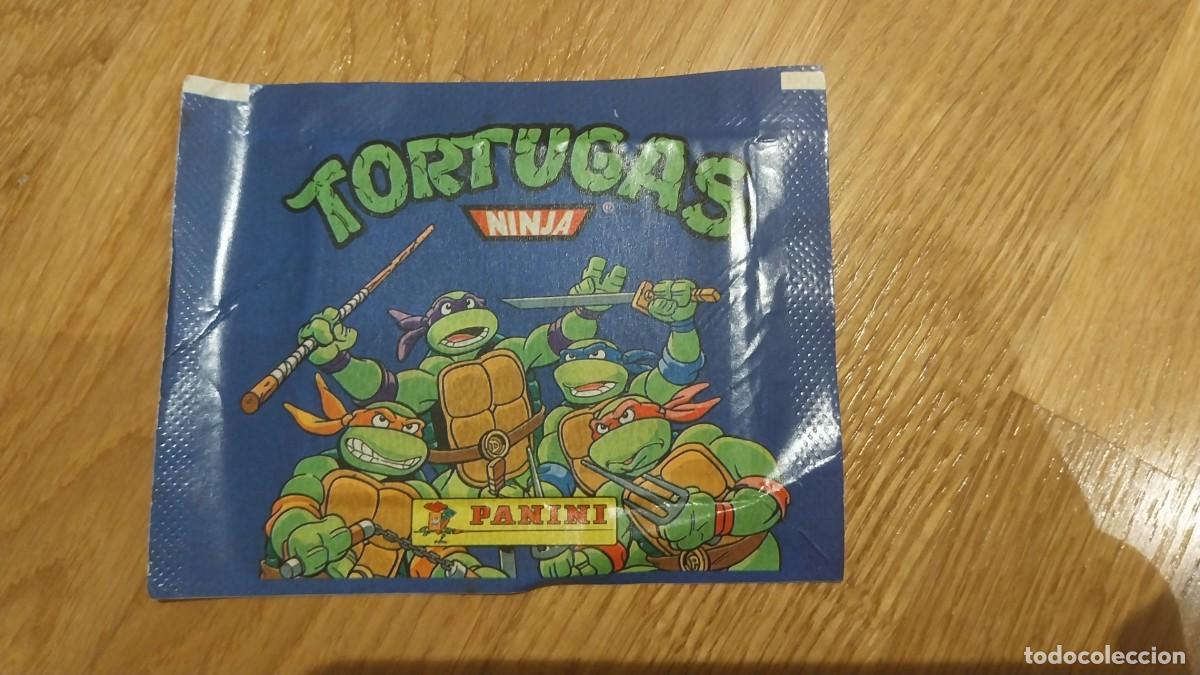 Coleccionismo Cromos antiguos: SOBRE SIN ABRIR TORTUGAS NINJA PANINI LEER