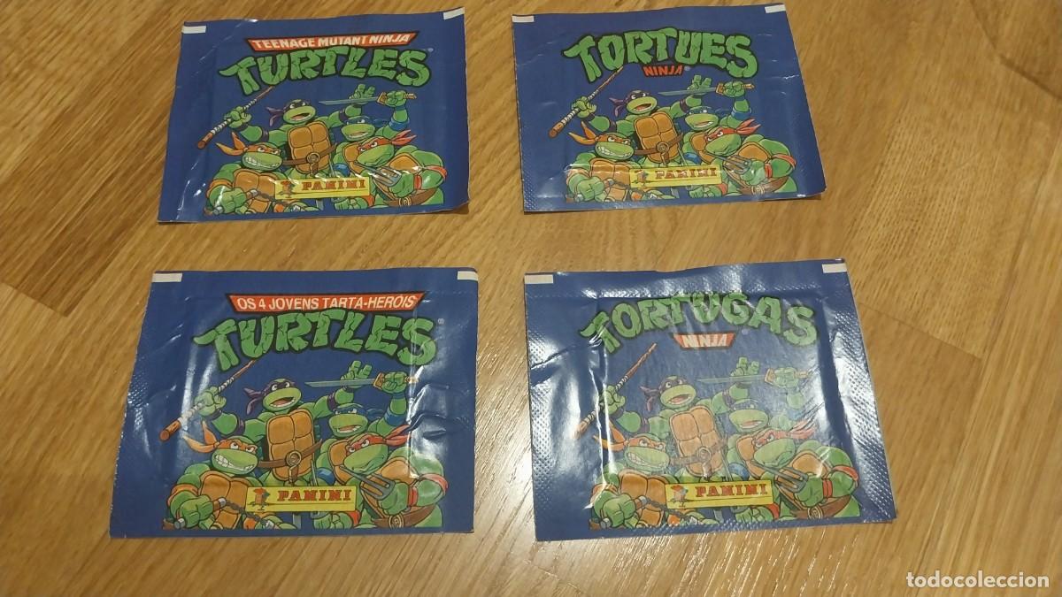 Coleccionismo Cromos antiguos: 4 SOBRE SIN ABRIR DIFERENTES VERSIONES TORTUGAS NINJA PANINI LEER