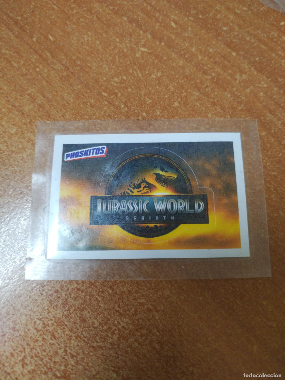 Coleccionismo Cromos antiguos: CROMO PEGATINA PHOSKITOS ( )JURASSIK WORLD NUEVO EN SU ENVOLTORIO DE 2025