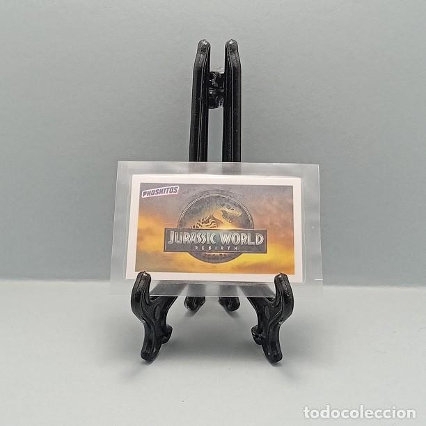 Coleccionismo Cromos antiguos: LOGO JURASSIC WORLD REBIRTH CROMO ADHESIVO STICKER PHOSKITOS 2025 (NUEVO PRECINTADO)