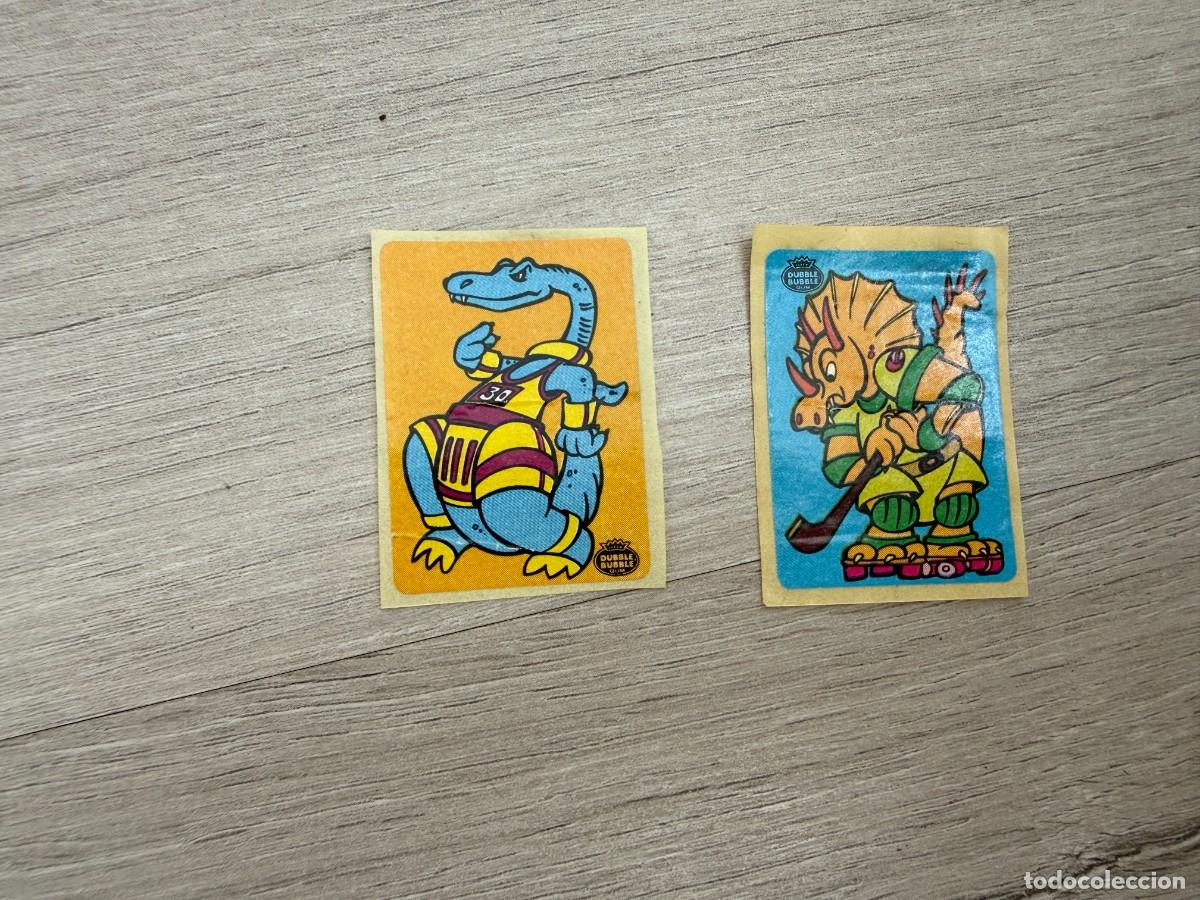 Coleccionismo Cromos antiguos: 2 pegatinas chicle Fleer Dinosaurios Deportistas