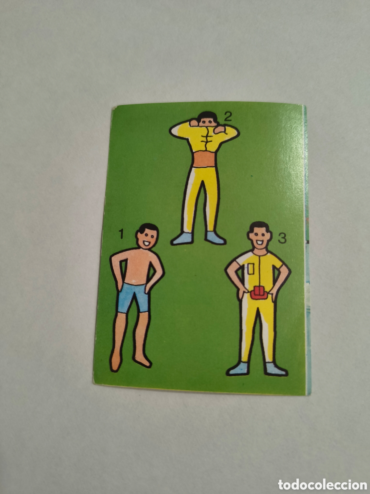 Collezionismo Figurine antiche: EL LIBRO DE LOS JUEGOS. BIMBO. 1979. LA AVENTURA DEL ESPACIO.COMO SE VISTE EL ASTRONAUTA CROMO 4