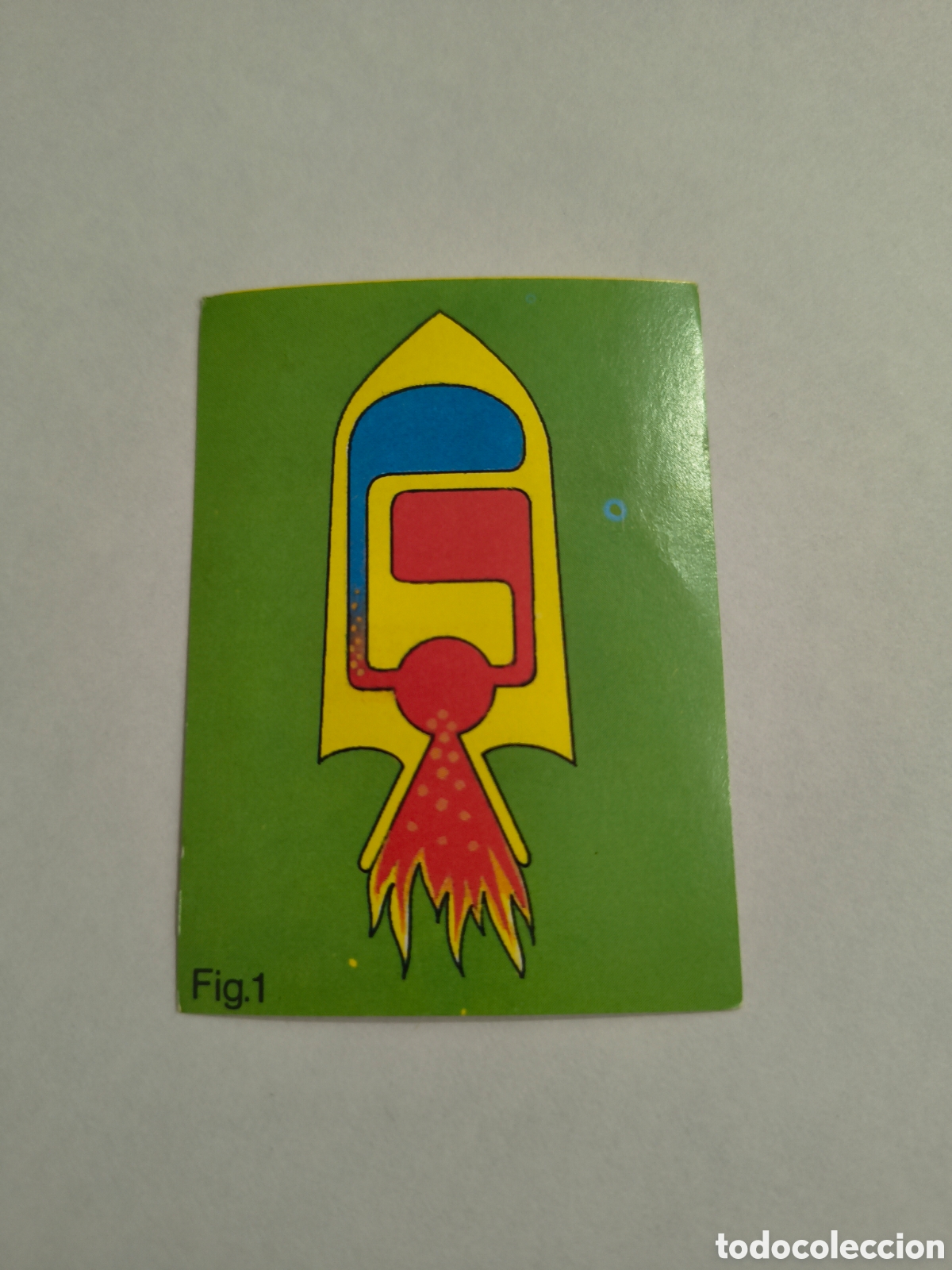 Collezionismo Figurine antiche: EL LIBRO DE LOS JUEGOS. BIMBO. 1979. LA AVENTURA DEL ESPACIO.CONSTRUYE UN COHETE A REACCION CROMO 6