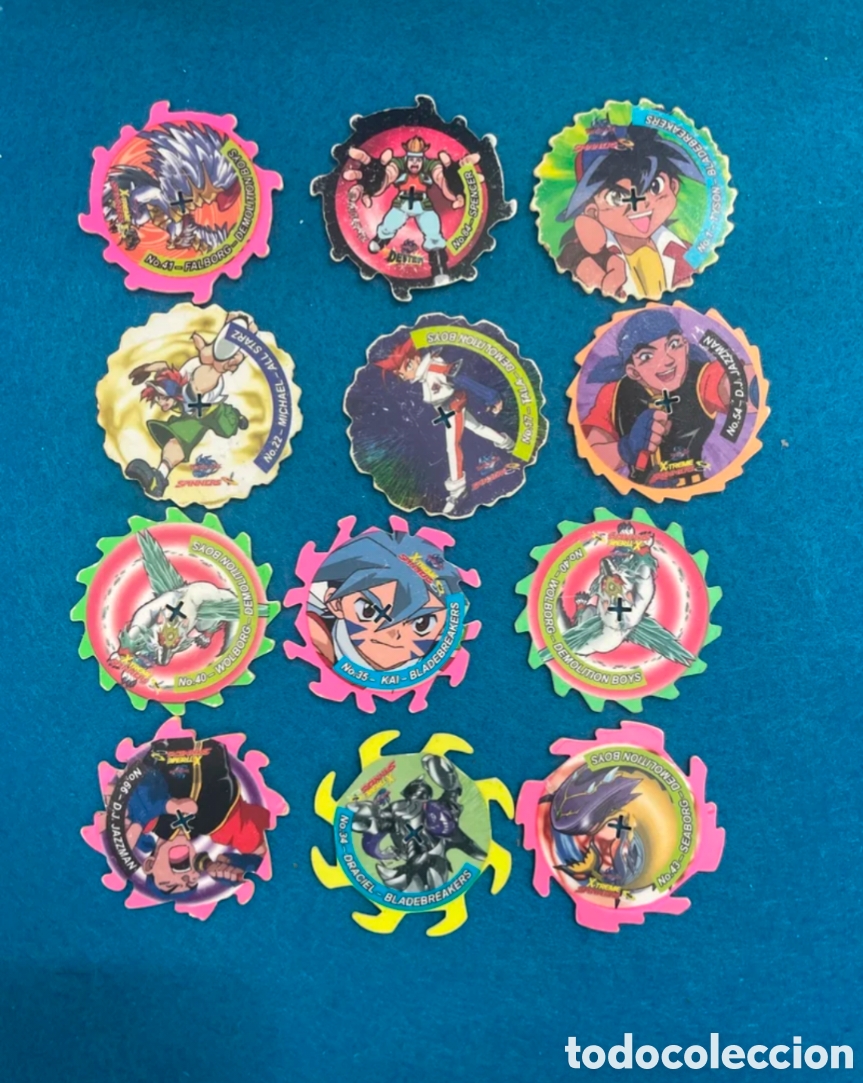 Coleccionismo Cromos antiguos: 12 tazos spinners xtreme