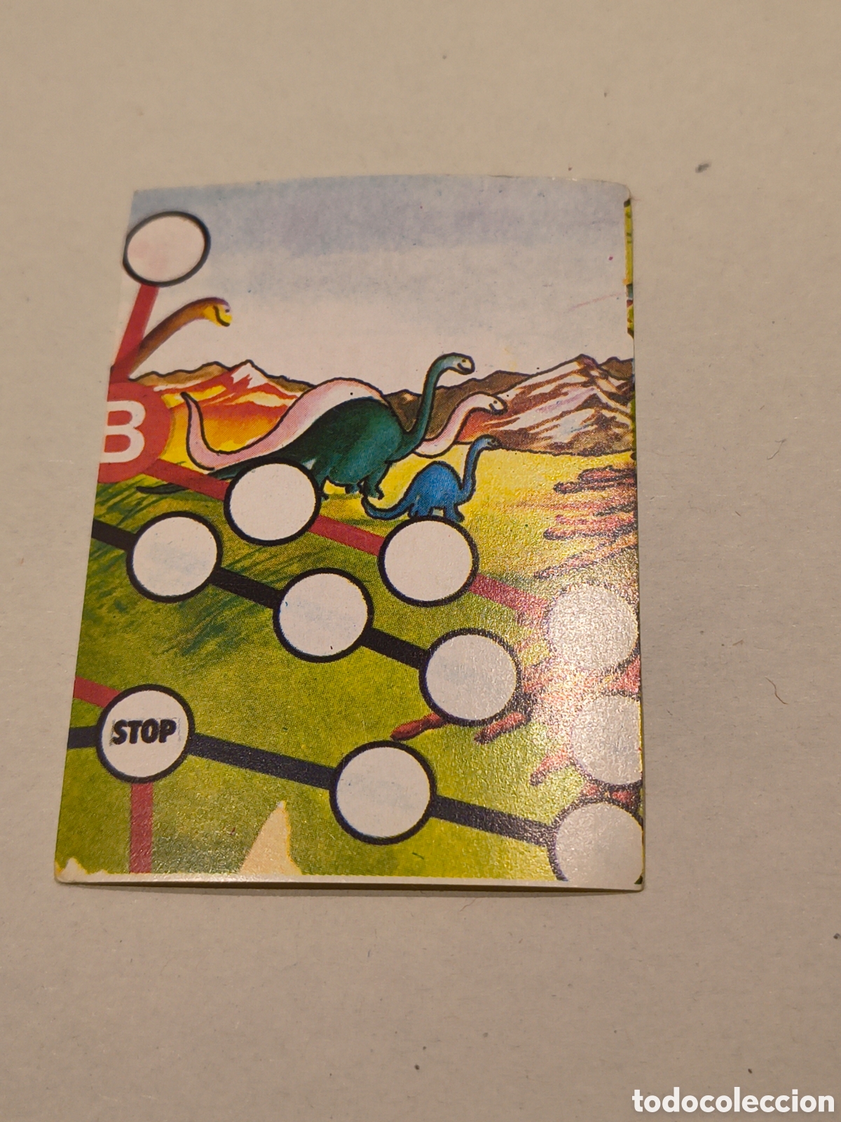 Coleccionismo Cromos antiguos: EL LIBRO DE LOS JUEGOS. BIMBO. 1979. HUIDA ENTRE SAURIOS