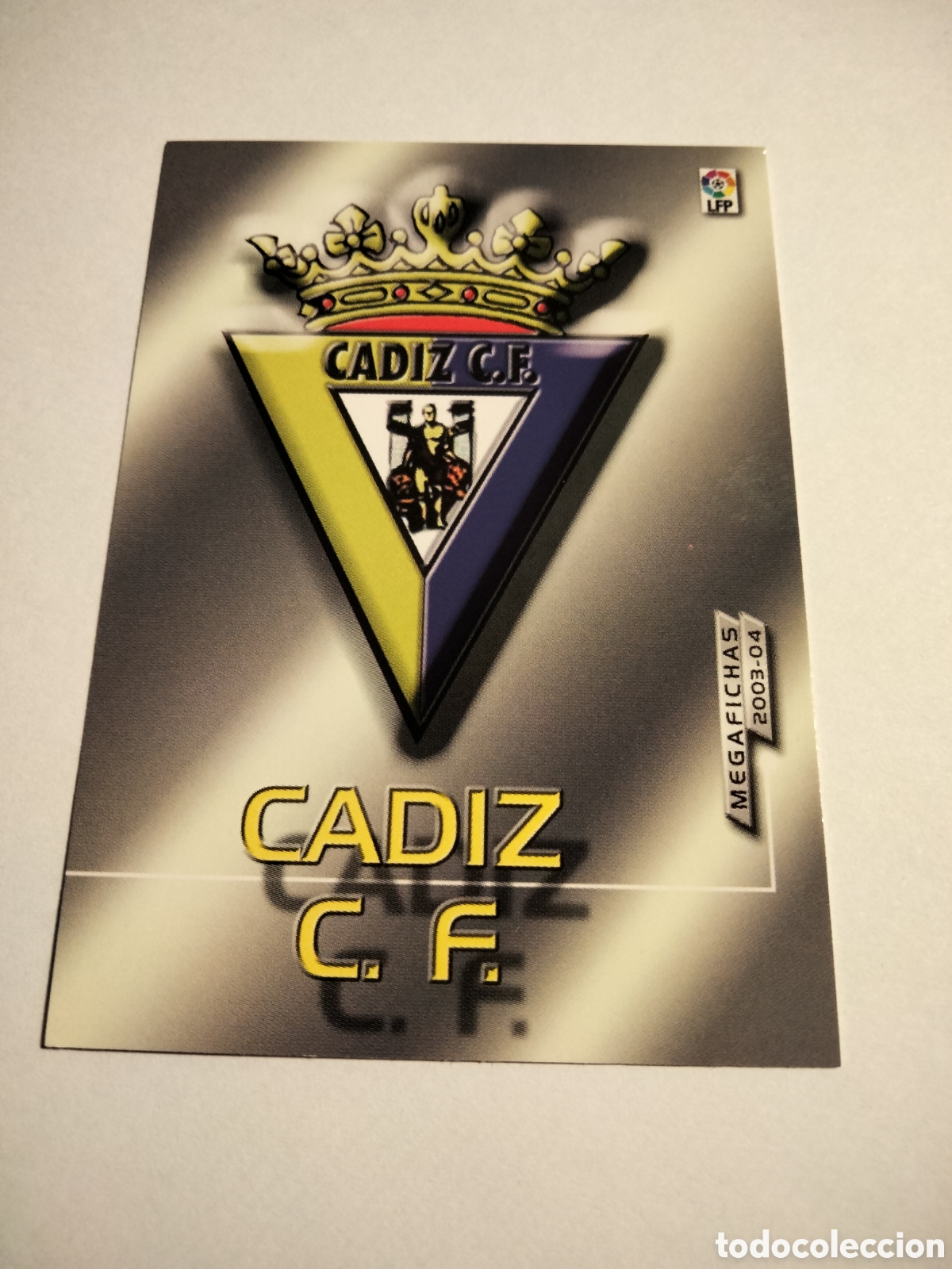 Coleccionismo cromos antiguos: ESCUDO LOGO # 409 CADIZ CF. SEGUNDA DIVISI&Oacute;N MEGAFICHAS ( MEGACRACKS) 2003/04 PANINI