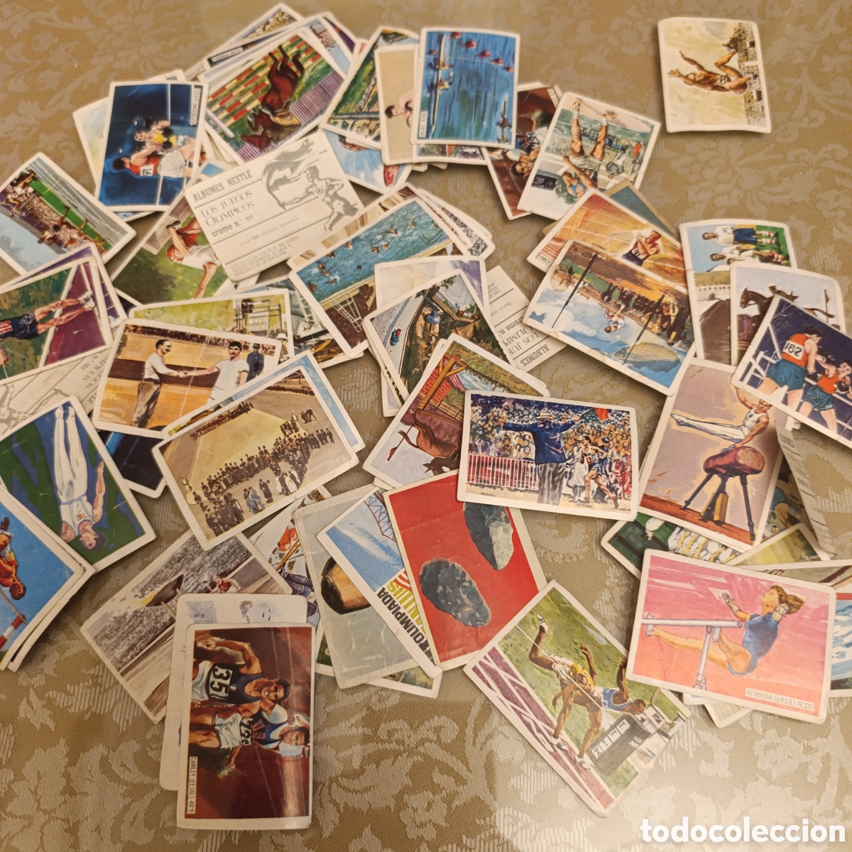 Coleccionismo cromos antiguos: Gran lote cromos &rdquo;Los Juegos Ol&iacute;mpicos&rdquo; lanzada por la Sociedad Nestl&eacute; en el a&ntilde;o 1964,sin pegar