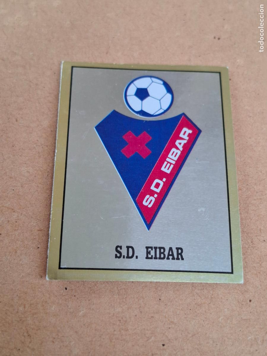 Coleccionismo cromos antiguos: F&Uacute;TBOL 90 - PANINI - 381 ESCUDO S.D. EIBAR ( NUNCA PEGADO ) CA