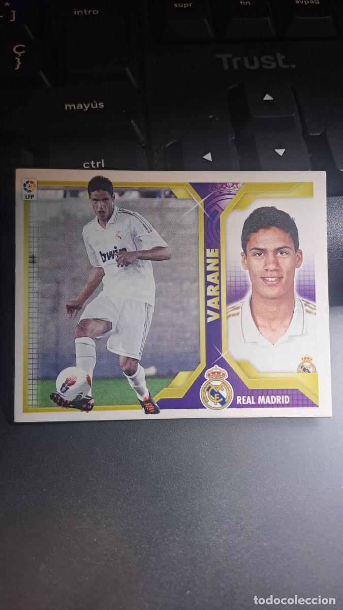 Coleccionismo cromos antiguos: CROMO VARANE 5 B5B COLOCA REAL MADRID LIGA 2011 2012 11 12 ESTE PANINI NUNCA PEGADO