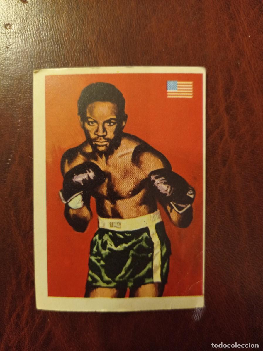 Coleccionismo cromos antiguos: 43 Charles Ezzard - Ases Mundiales del Deporte QUELCOM 1979