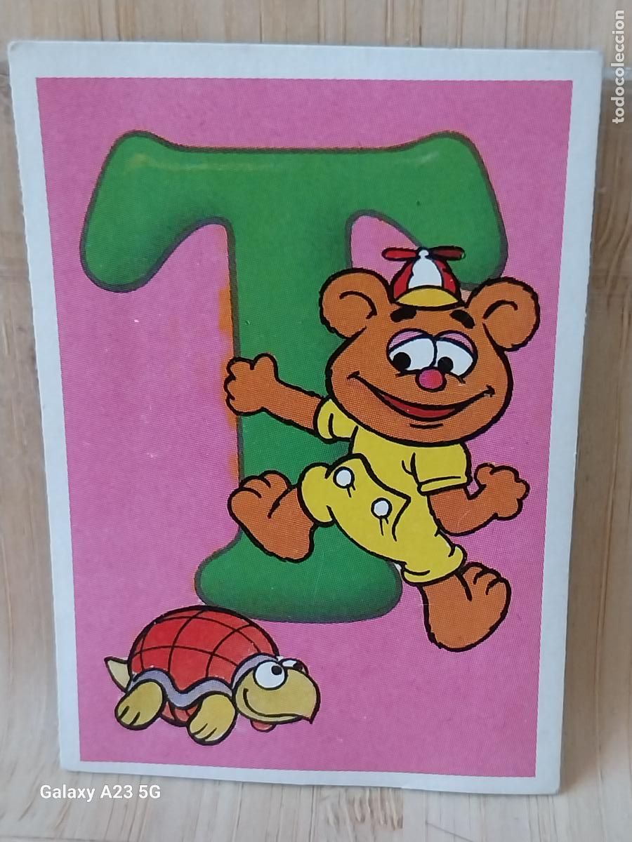 Colecionismo Cromos antigos: PEQUE&Ntilde;ECOS BARRIO SESAMO SESAME STREET ED ESTE 1986 CROMO 112 LETRA T FOZZIE ORIGINAL RECUPERADO