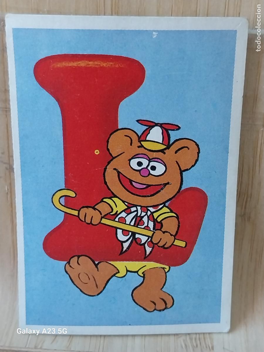 Coleccionismo cromos antiguos: PEQUE&Ntilde;ECOS BARRIO SESAMO SESAME STREET ED ESTE 1986 CROMO 102 LETRA L FOZZIE ORIGINAL RECUPERADO