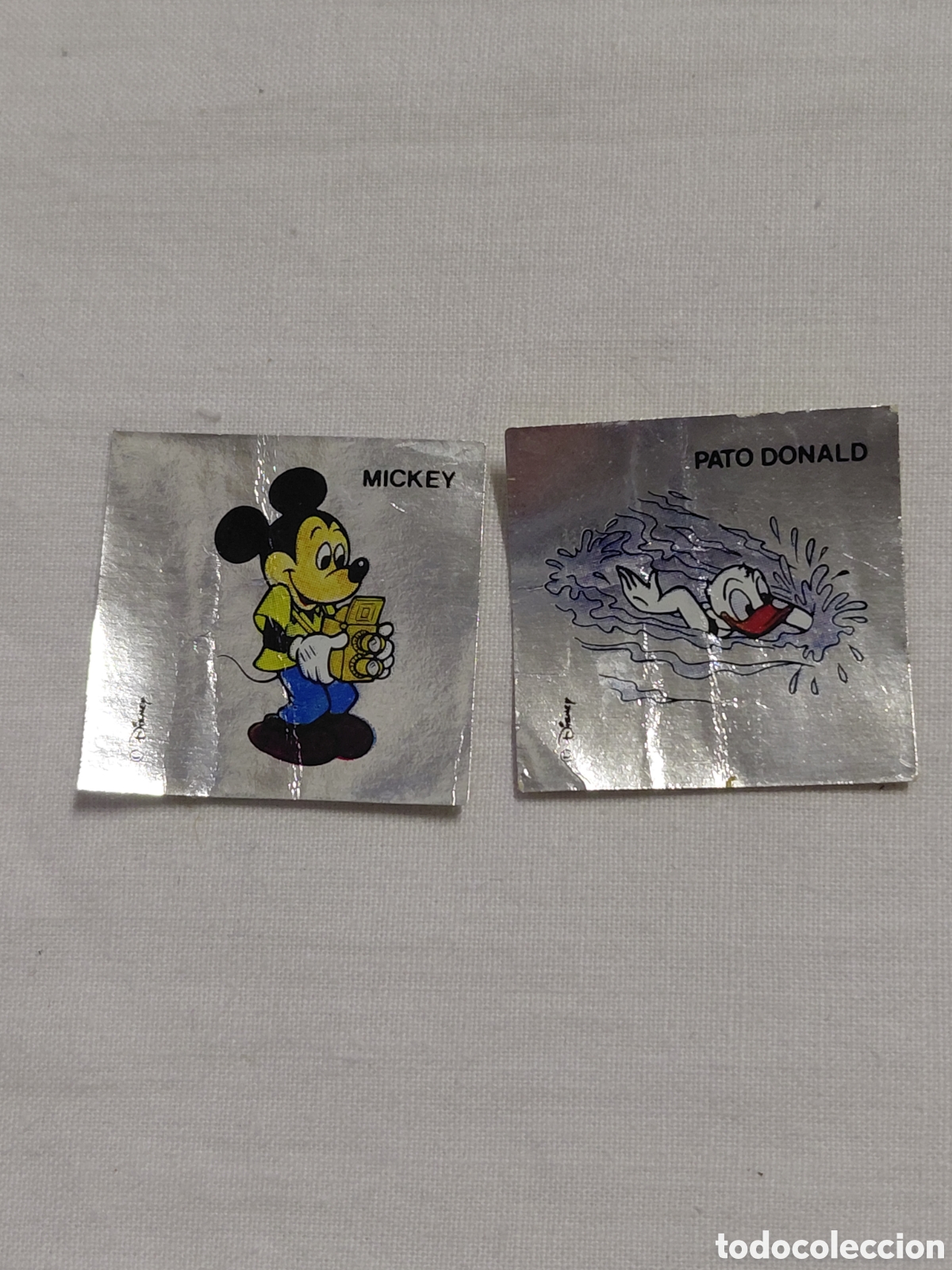 Colecionismo Cromos antigos: 2 CROMOS PEGATINAS PLATEADAS WALT DISNEY CHICLES.MICKEY Y PATO DONALD.FALTAN LAS TRASERAS